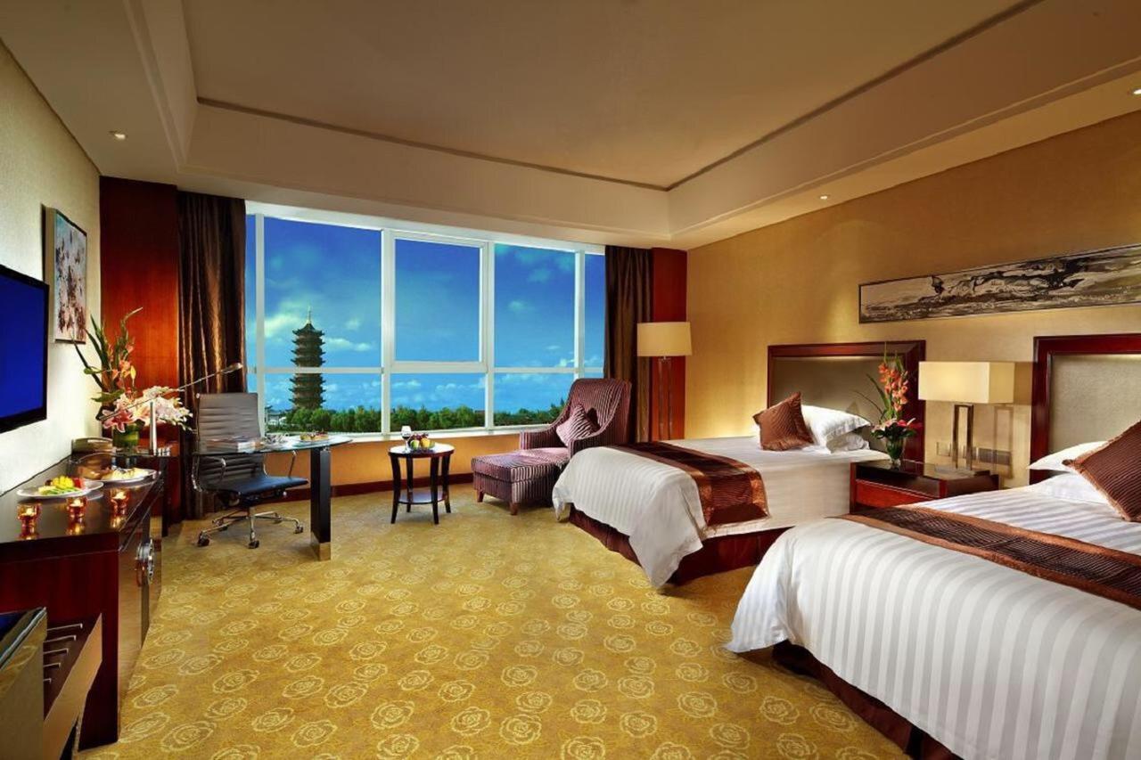 Jurong Yukun New Century Hotel Jiangsu חדר תמונה