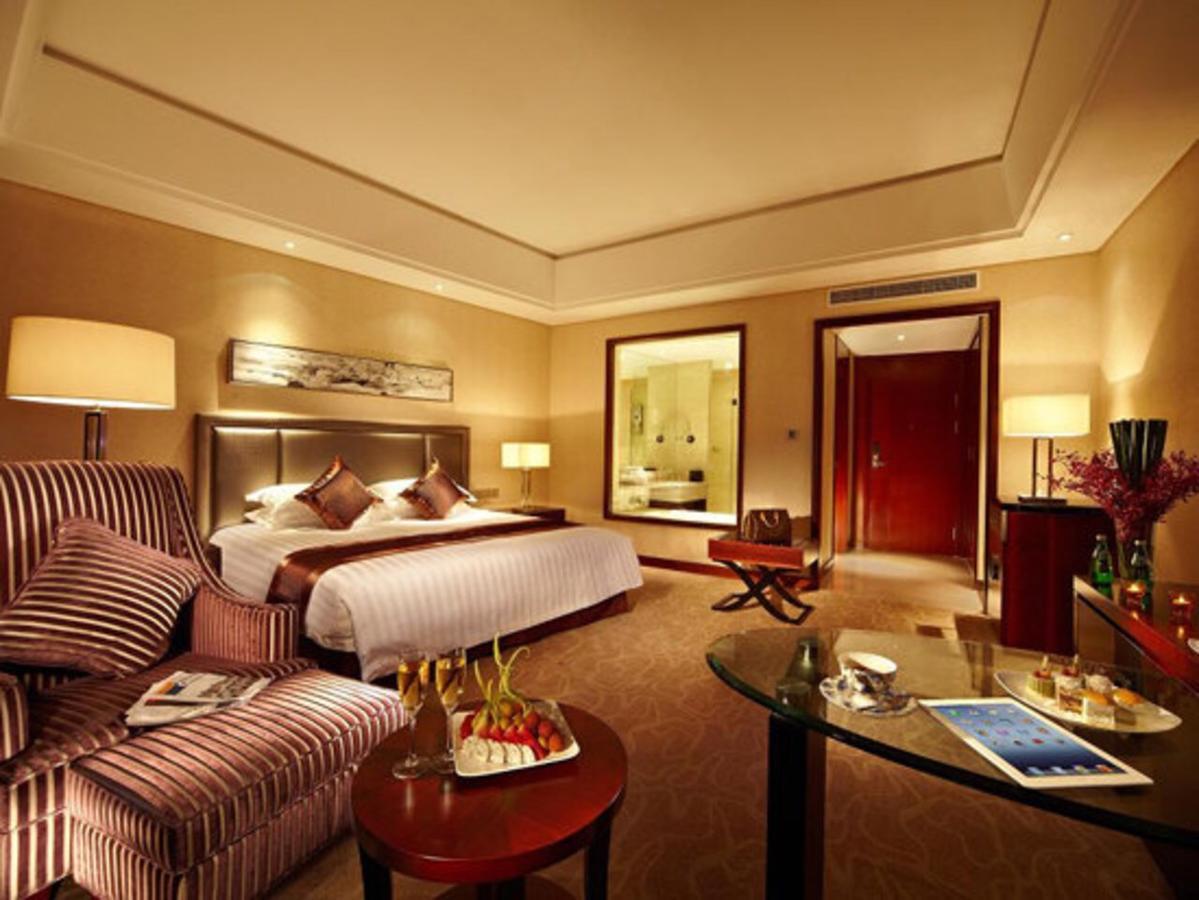 Jurong Yukun New Century Hotel Jiangsu חדר תמונה