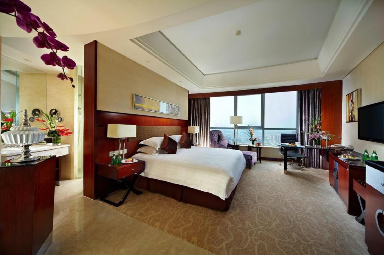 Jurong Yukun New Century Hotel Jiangsu חדר תמונה